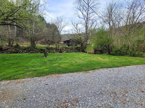 Large grassy creekside tent site!
