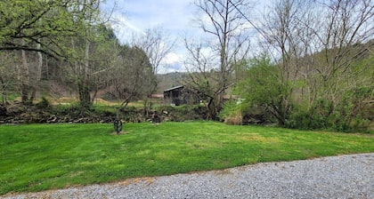 Large grassy creekside tent site!