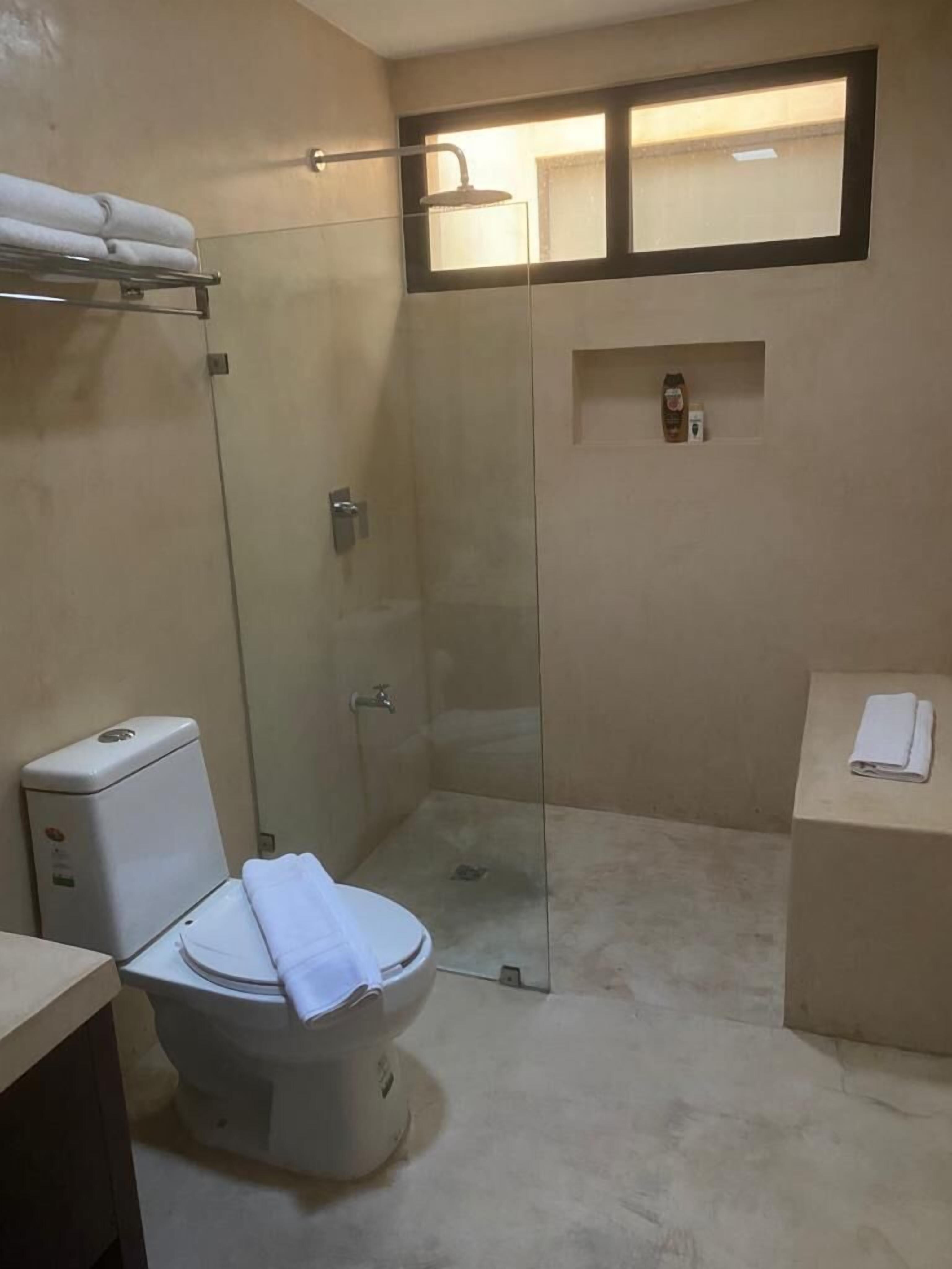 superior studio suite, 1 bedroom | bathroom | shower, hair dryer