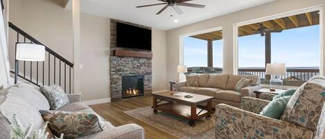 Enjoy the comforts of the Living Room while looking at the beautiful view of Table Rock Lake.