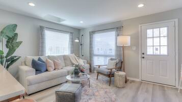 Condo, 1 King Bed with Sofa bed, Balcony, Pool View | Living area | 40-inch TV with digital channels