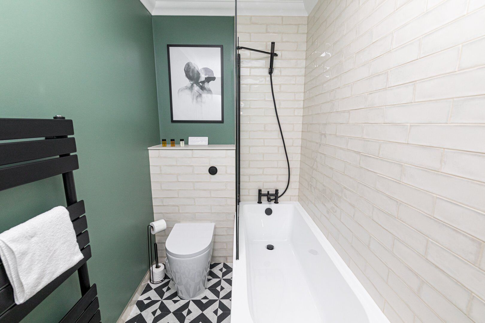 Bathtub, hair dryer, towels
