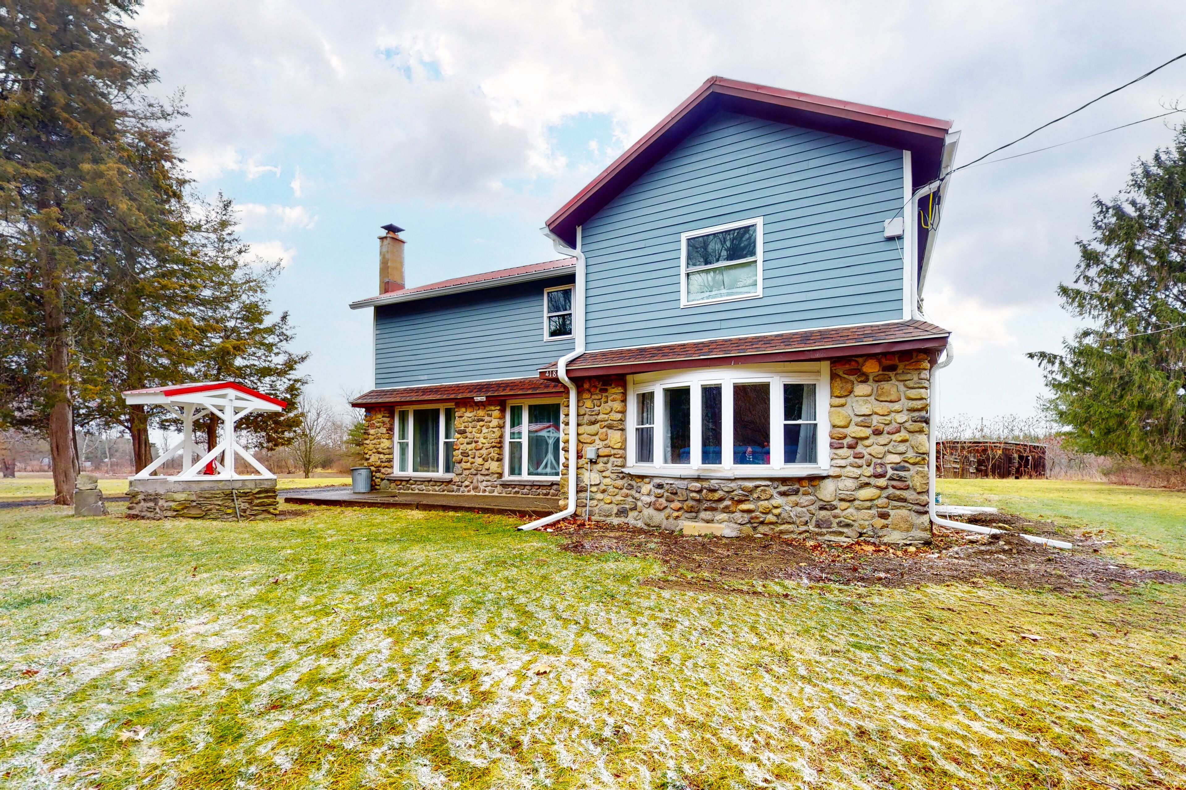 Country escape on 43 acres with boat launch access, a firepit, grill, & W/D