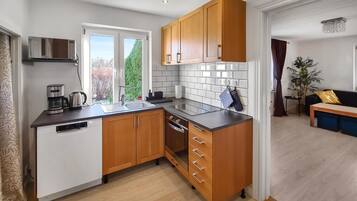 Réfrigérateur, four, lave-vaisselle, cafetiÚre/bouilloire