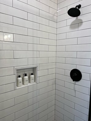 Shower, hair dryer, towels, soap