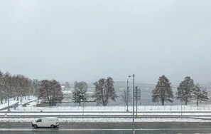 A snowy landscape with a road and a white van. - Amazing apartment in Sommen with WiFi (Sommen)