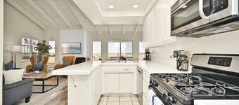 Oceanfront Home on the Boardwalk w/ 3 car Garage, AC, Giant Patio, Ocean Views, Walk to Pier