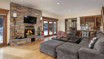 Smart TV, fireplace, books