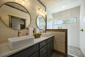 Combined shower/tub, hair dryer, towels, soap