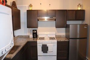Fridge, microwave, oven, stovetop - The Geneva Getaway- remodeled apartment walking distance from downtown Geneva (Geneva)