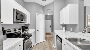 Fridge, microwave, oven, stovetop - Ultimate 3 Bedroom Condo on Windsor Palms Resort, Orlando Condo 6143 (Orlando)