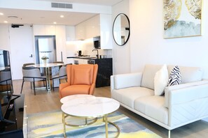 1 Bedroom City View - Free WIFI | Living area | 50-inch Smart TV with digital channels, TV - Kooii Apartments (Fortitude Valley)