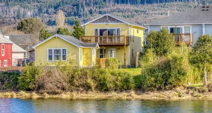 Serene riverfront home with gas fireplace, W/D, balcony, patio, & board games