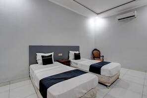 Chambre Deluxe avec lits jumeaux | Accès au Wi-Fi (inclus), literie fournie