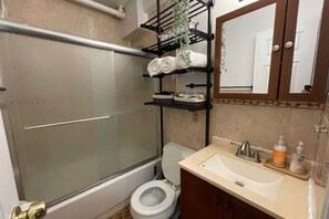 Hair dryer, towels, soap, shampoo