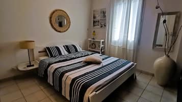 1 bedroom, desk, iron/ironing board, travel cot