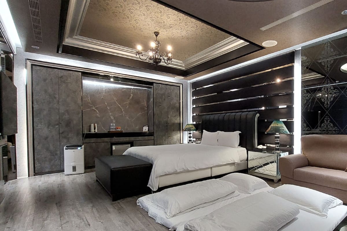 Deluxe Quadruple Room (run of house, Check in after 20:00PM) | Free minibar, free WiFi, bed sheets