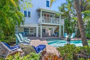A heated pool, pool loungers