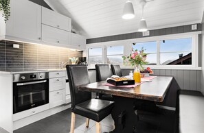 Appartamento Deluxe | Cucina privata | Frigorifero, forno, piano cottura, lavastoviglie