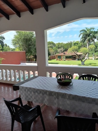 Outdoor dining. Beautiful colonial-style house a step away from the center of Aregua