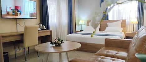 Habitación Premium | Ropa de cama de alta calidad y caja de seguridad en la habitación