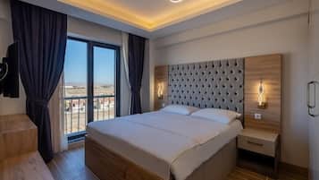 Suite familiar, 1 habitación | Sábanas de algodón egipcio y ropa de cama de alta calidad