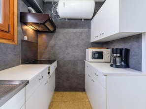 Fridge, microwave, cookware/dishes/utensils