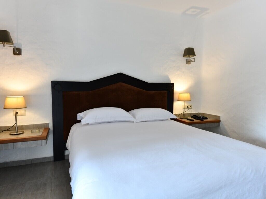 Ropa de cama de alta calidad y minibar 