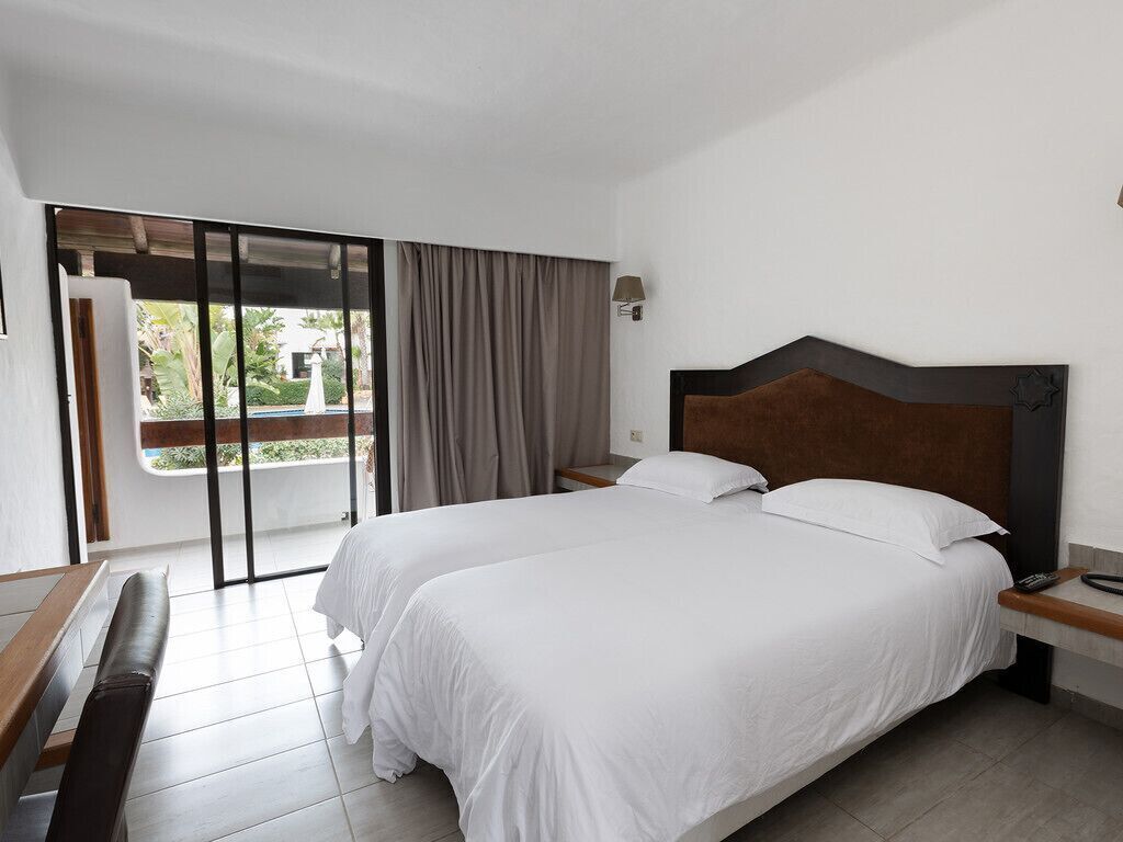 Ropa de cama de alta calidad y minibar 