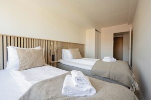 Biggy Apartment - 2 Bedroom | アイロン / アイロン台、WiFi (無料)、ベッドシーツ