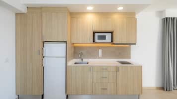 Fridge, microwave, stovetop, coffee/tea maker