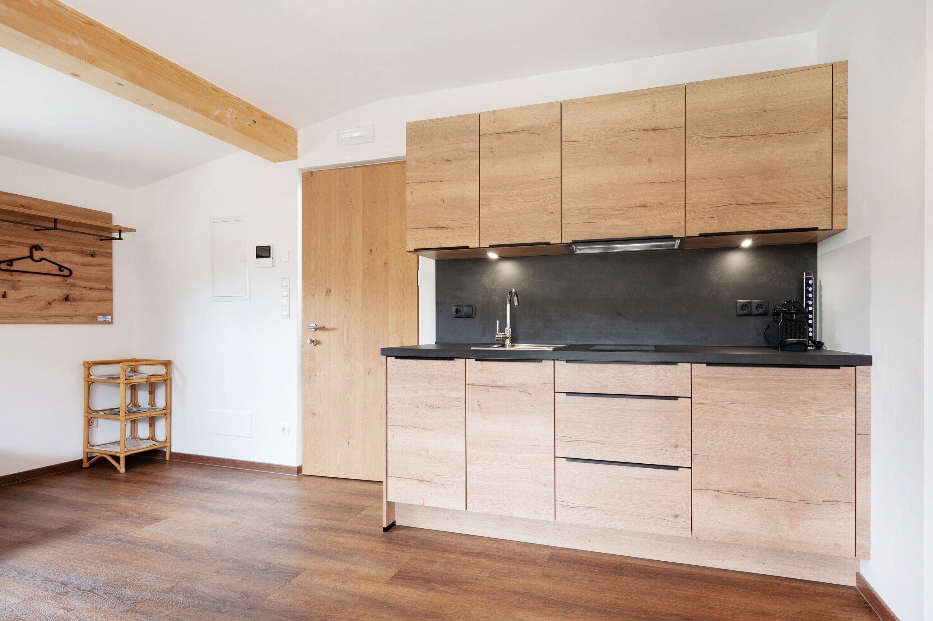 Fridge, stovetop, dishwasher, coffee/tea maker