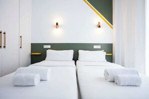 2 habitaciones, escritorio, tabla de planchar con plancha y wifi gratis 