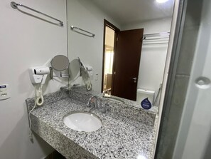 Hair dryer, towels, soap, shampoo