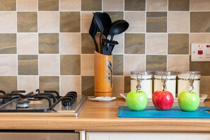 Fridge, microwave, cookware/dishes/utensils