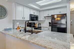 Fridge, microwave, oven, stovetop - Ocean-view condo with pools, hot tub & beach access - private balcony, W/D (Myrtle Beach)