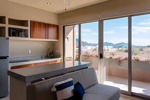 Departamento | Área de sala de estar | Televisión de pantalla plana de 65 pulgadas con canales por cable 