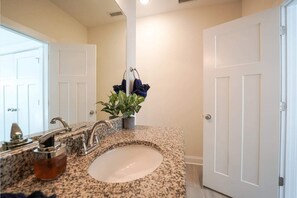 Bathtub, hair dryer, towels