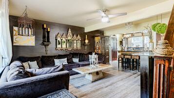 House, Multiple Beds, Balcony, Garden View | Living area | 40-inch TV with digital channels