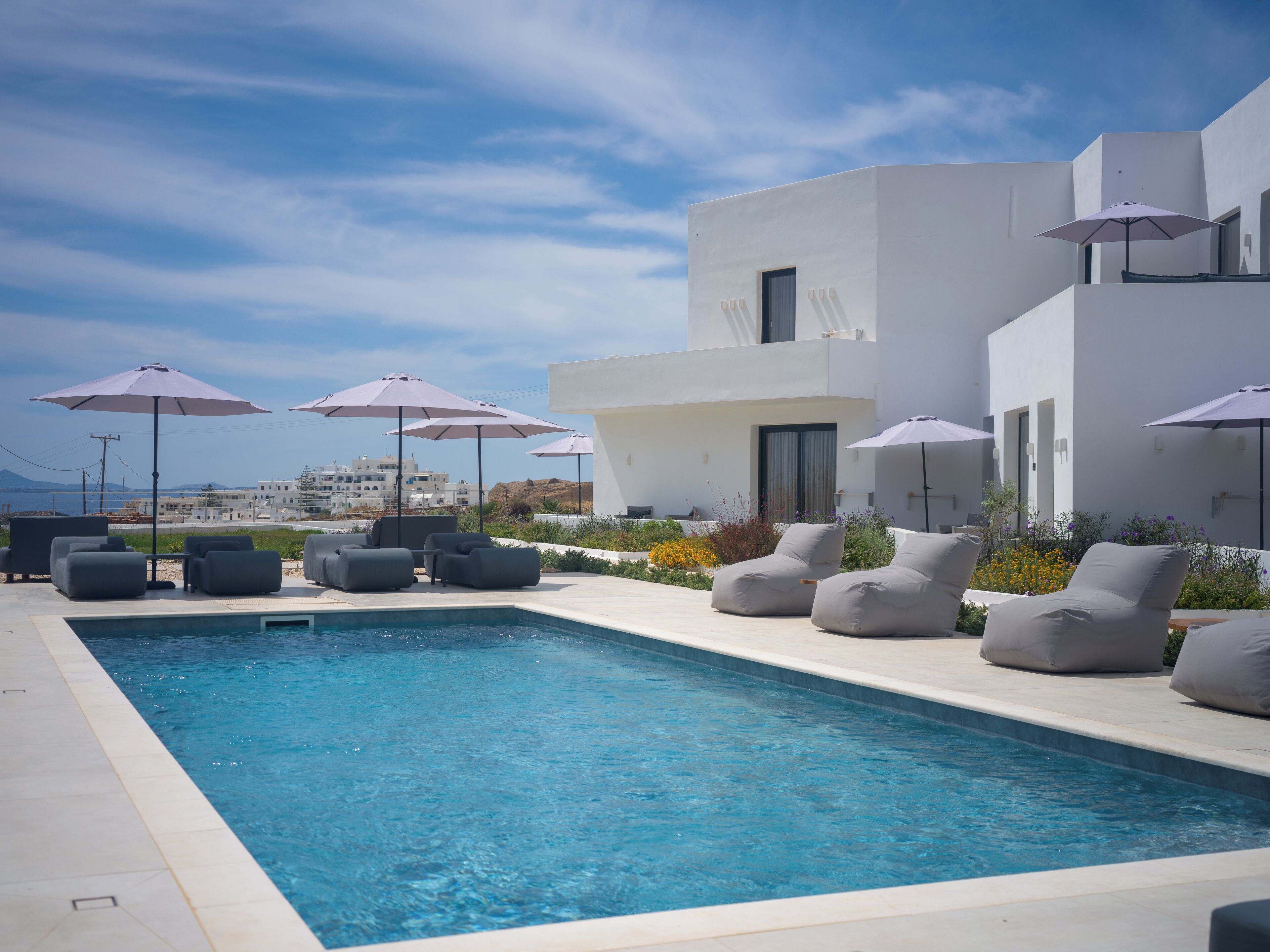 Seasonal outdoor pool, pool umbrellas, pool loungers