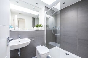 Bathtub, hair dryer, towels