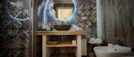 Shower, free toiletries, hair dryer, bathrobes