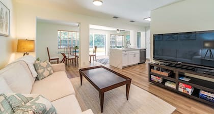 West of 41. Walk 6 minutes to the Lowdermilk beach, theatre, mall and grocery.