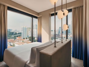 Suite, 1 cama King size | 1 habitación, minibar, caja de seguridad en la habitación y escritorio