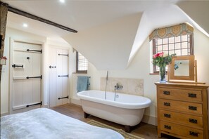 Bathtub, hair dryer, towels