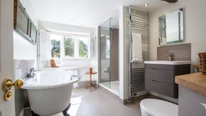 Bathtub, hair dryer, towels