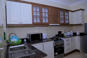 Fridge, microwave, oven, coffee/tea maker