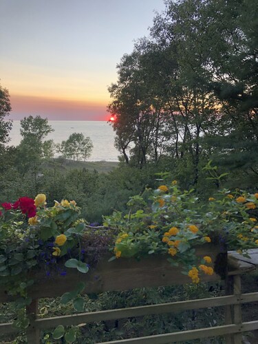 Charming, beach house close to town on  dune with fabulous view of Lake Michigan