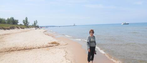 On the beach, sun-loungers, beach towels