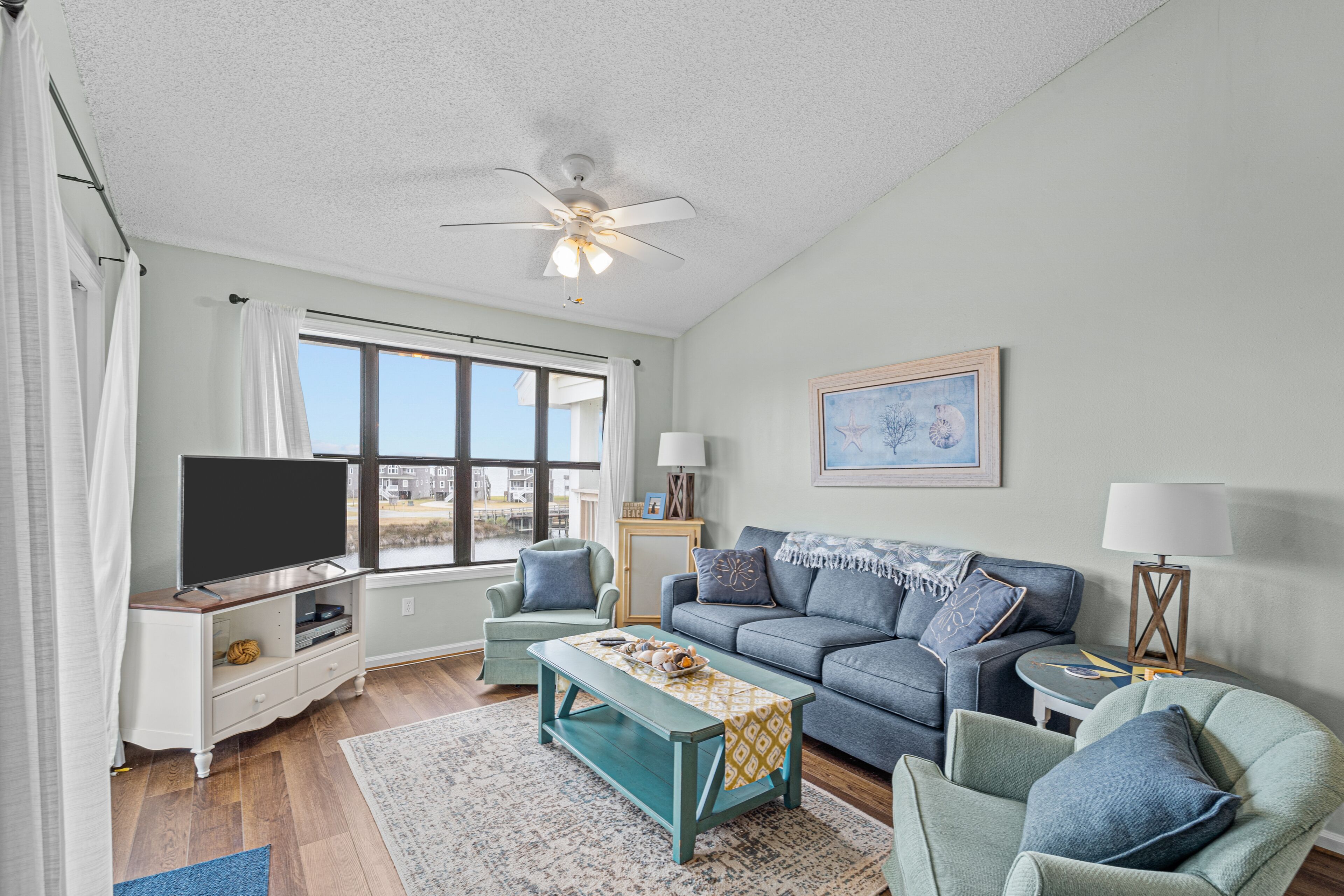 Lovely canal front condo with pool, kitchen, washer/dryer, TV, & board games